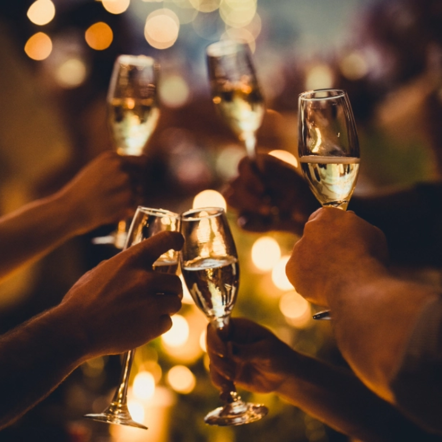 Celebrating with champagne glasses