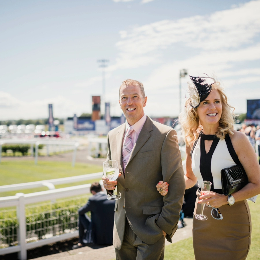 A couple dressed up for race day at Cheltenham