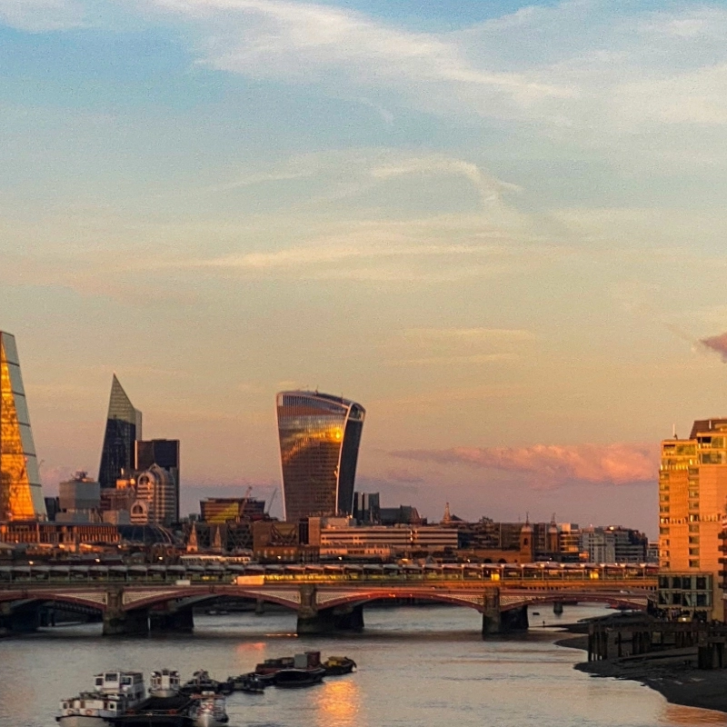 The London skyline over the Thames at sunset