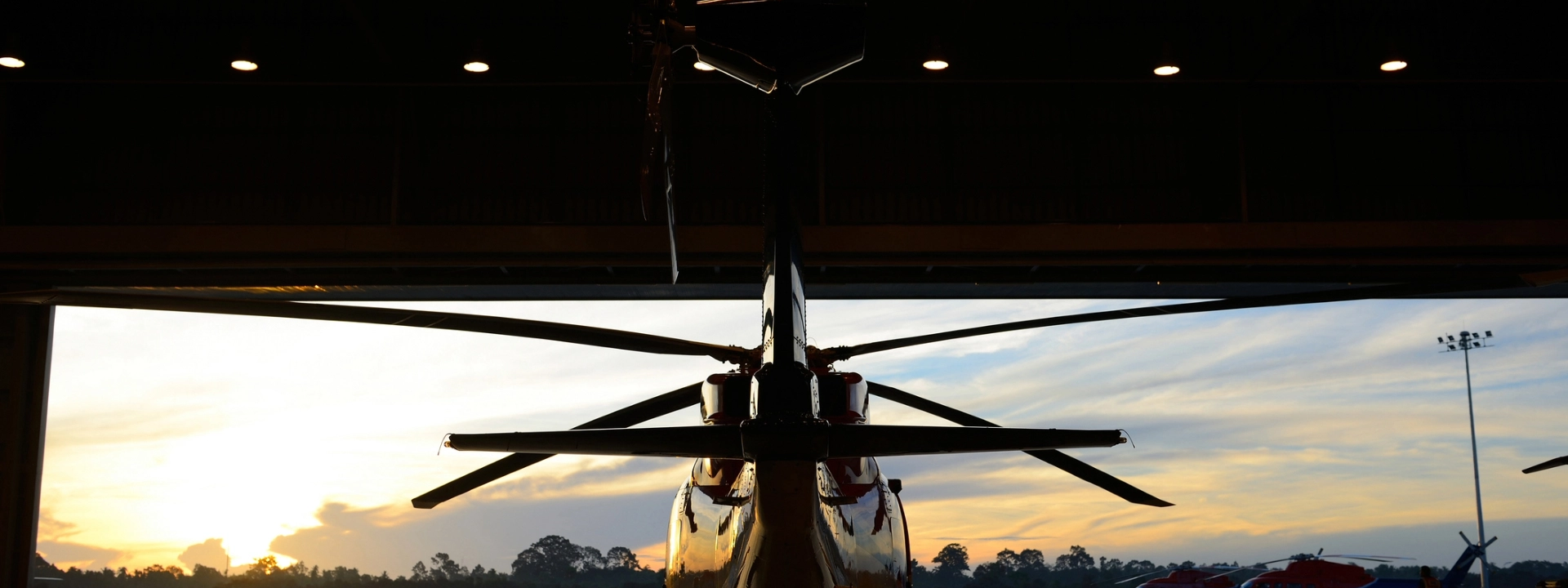 A helicopter in a hangar